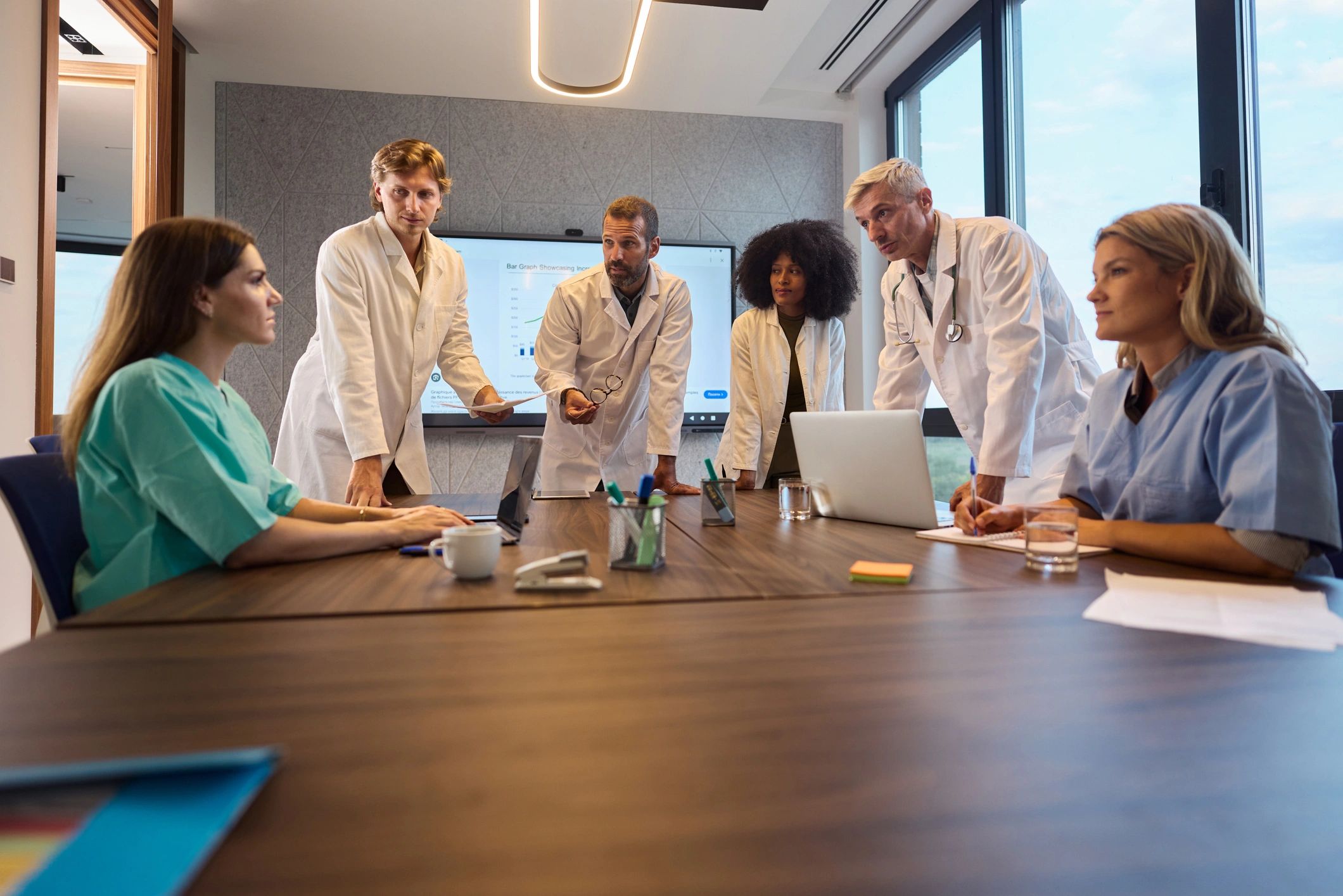 Research professionals meeting in a modern academic setting